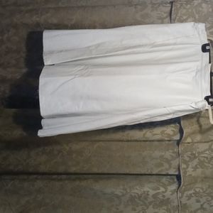 A eggshell leather skirt set